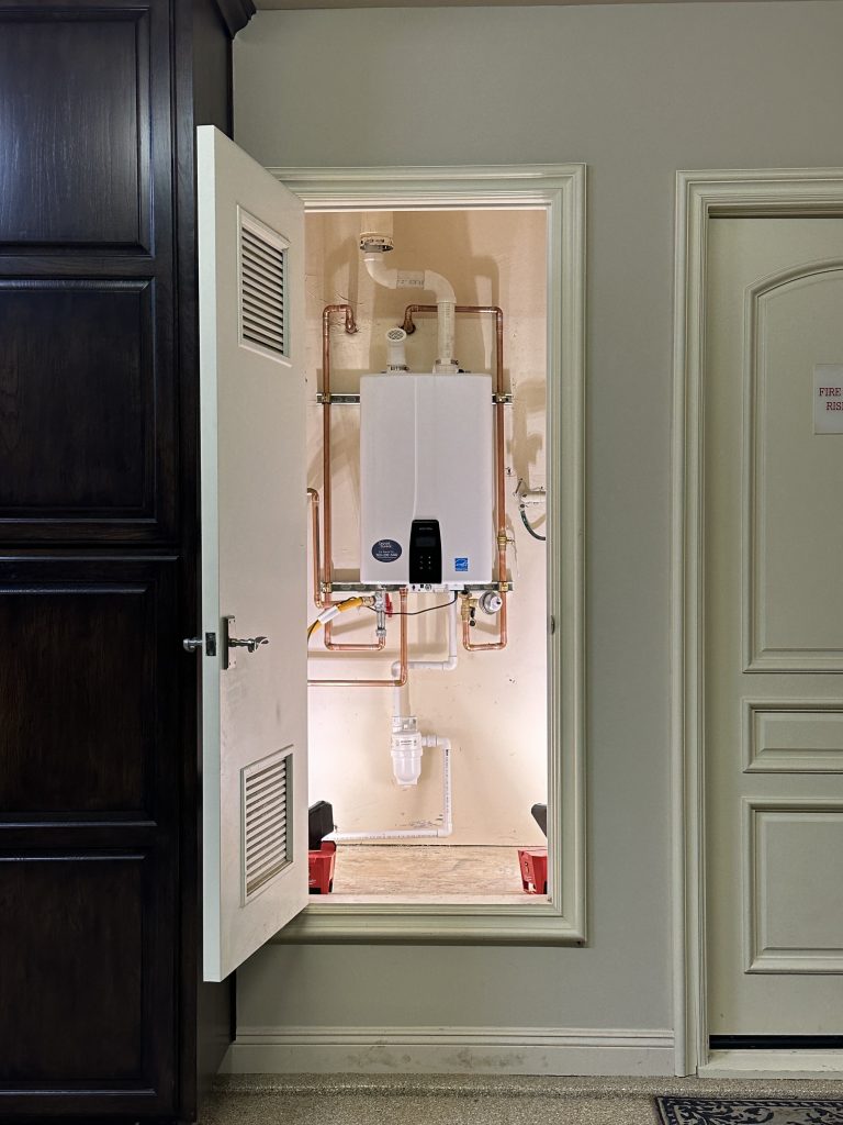 Navien tankless water heater installed in garage in Rancho Santa Fe home